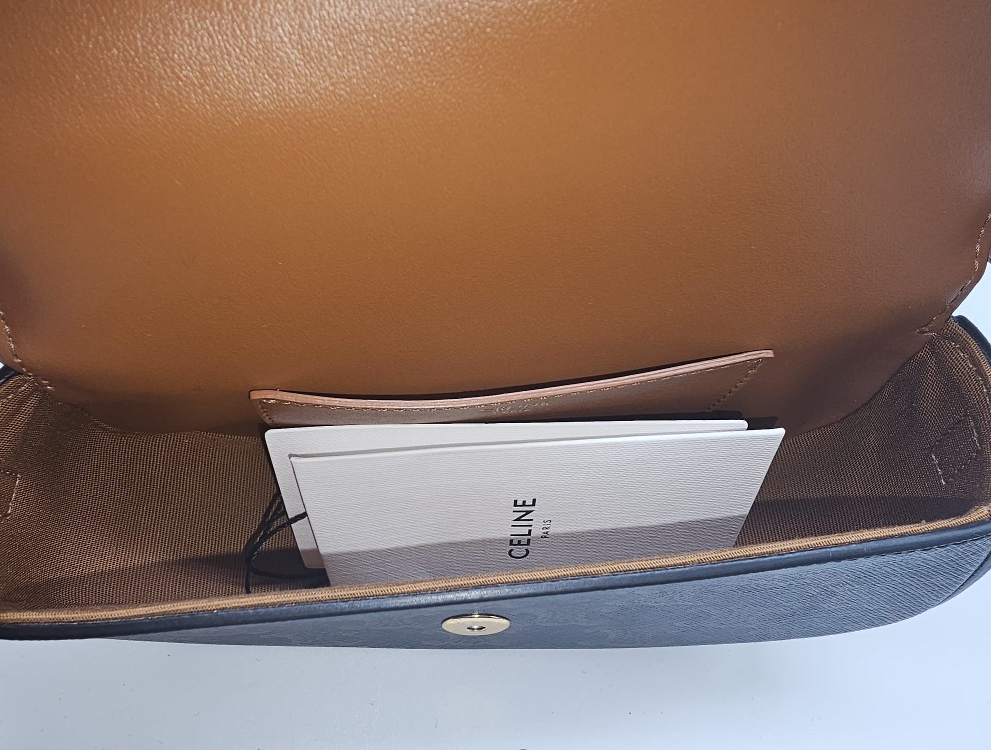 Pochette con tracolla, modello Tabou, in tela Triomphe